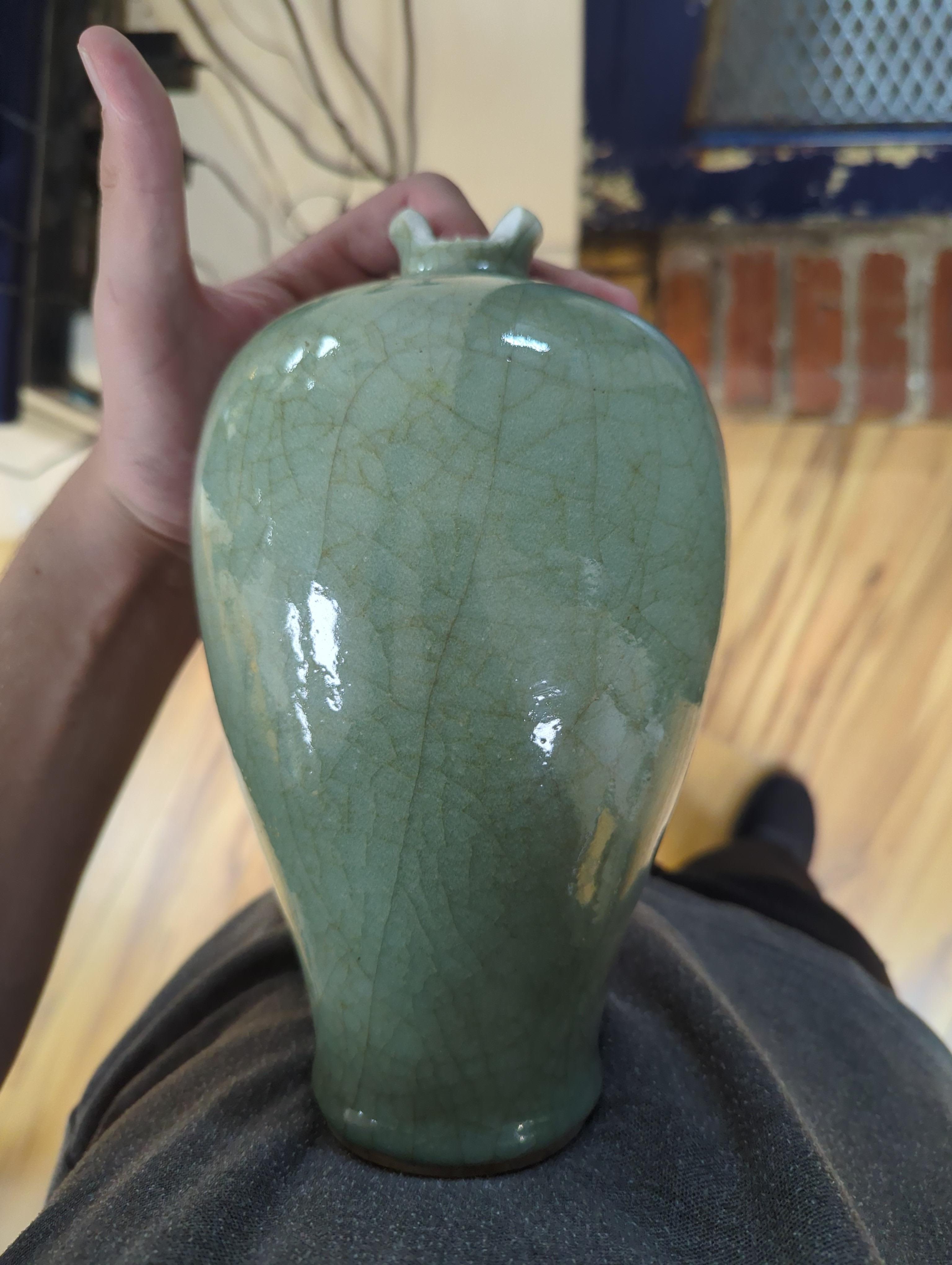 A Chinese celadon crackle glazed vase, 24cm